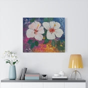 Hibiscus painting print on wall above desk